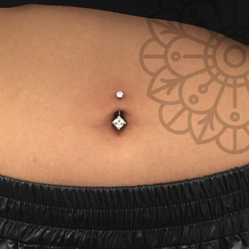 Belly button navel best sale piercing