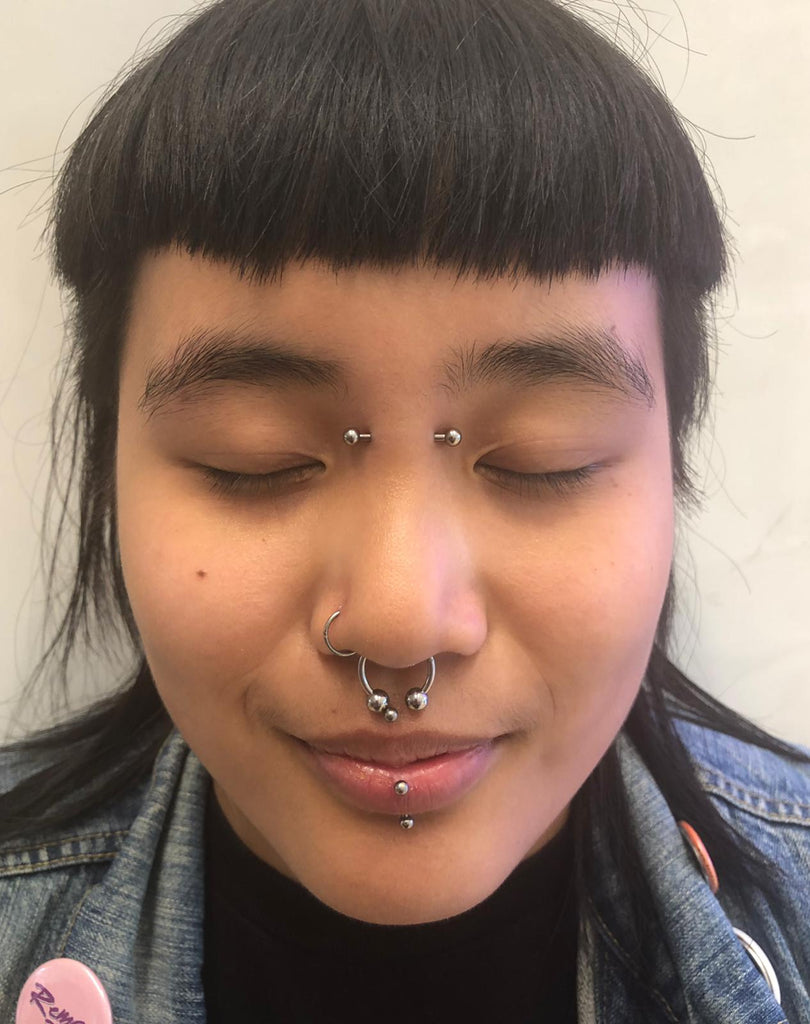 The Ultimate Guide to Bridge Piercings: Types, Aftercare, and Tips – Pierced